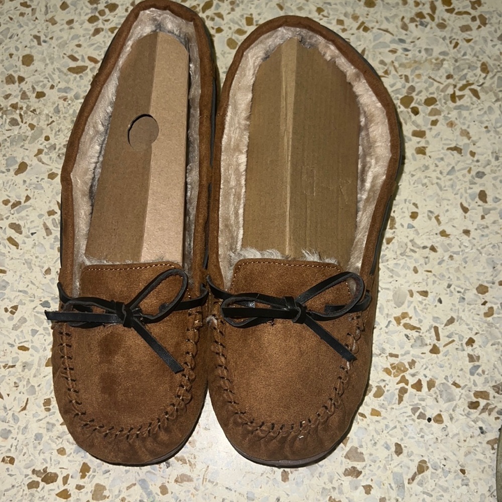 These are kolili(good for life)size 9 women and fuzzy and brown